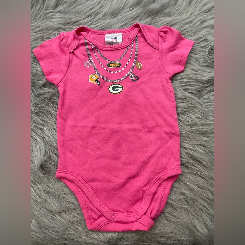 NWOT NFL Pink Baby Onesie with Team Graphics